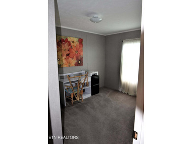 Welcome to this beautifully maintained 3-bedroom, 2-bath home on Woodlake Golf Club in Tennessee - for sale on GolfHomes.com, golf home, golf lot