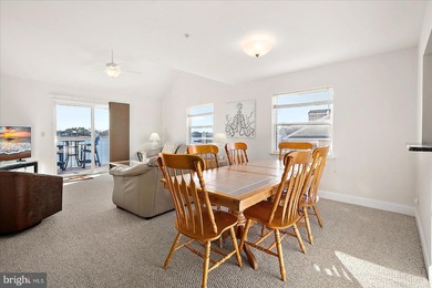 Discover waterfront living at its finest in this top floor, end on Bethany Bay Golf Club in Delaware - for sale on GolfHomes.com, golf home, golf lot