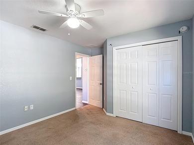 Great home with a gated entry, a well-maintained community, and on Meadow Oaks Golf and Country Club in Florida - for sale on GolfHomes.com, golf home, golf lot