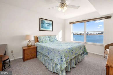 Discover waterfront living at its finest in this top floor, end on Bethany Bay Golf Club in Delaware - for sale on GolfHomes.com, golf home, golf lot