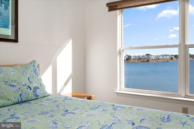 Discover waterfront living at its finest in this top floor, end on Bethany Bay Golf Club in Delaware - for sale on GolfHomes.com, golf home, golf lot