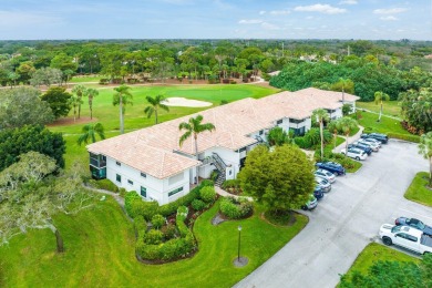 Double fairway views from this lovely second-floor residence on Quail Ridge Golf Course and Country Club in Florida - for sale on GolfHomes.com, golf home, golf lot