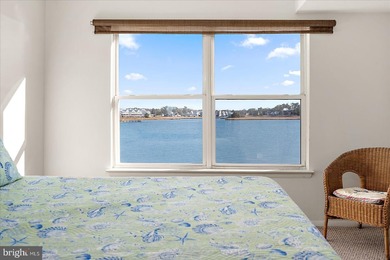 Discover waterfront living at its finest in this top floor, end on Bethany Bay Golf Club in Delaware - for sale on GolfHomes.com, golf home, golf lot