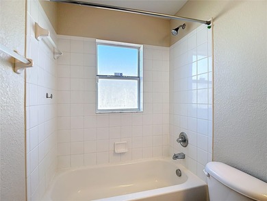 Great home with a gated entry, a well-maintained community, and on Meadow Oaks Golf and Country Club in Florida - for sale on GolfHomes.com, golf home, golf lot