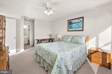 Discover waterfront living at its finest in this top floor, end on Bethany Bay Golf Club in Delaware - for sale on GolfHomes.com, golf home, golf lot