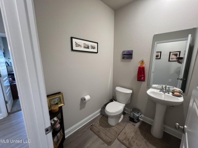 This ''Camden'' floor by Dr Horton The mother-in-law suite on Pine Bayou Golf Course in Mississippi - for sale on GolfHomes.com, golf home, golf lot