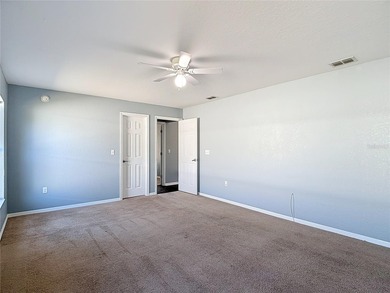 Great home with a gated entry, a well-maintained community, and on Meadow Oaks Golf and Country Club in Florida - for sale on GolfHomes.com, golf home, golf lot