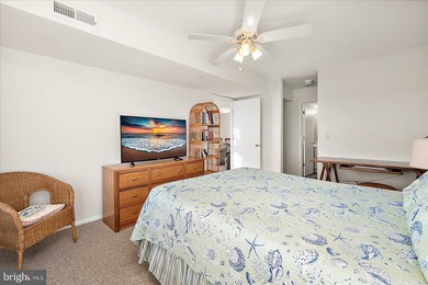 Discover waterfront living at its finest in this top floor, end on Bethany Bay Golf Club in Delaware - for sale on GolfHomes.com, golf home, golf lot