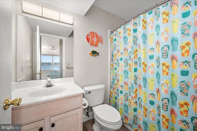 Discover waterfront living at its finest in this top floor, end on Bethany Bay Golf Club in Delaware - for sale on GolfHomes.com, golf home, golf lot