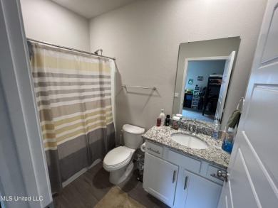 This ''Camden'' floor by Dr Horton The mother-in-law suite on Pine Bayou Golf Course in Mississippi - for sale on GolfHomes.com, golf home, golf lot