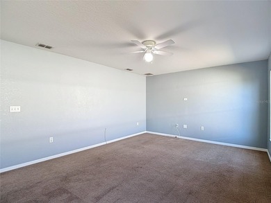 Great home with a gated entry, a well-maintained community, and on Meadow Oaks Golf and Country Club in Florida - for sale on GolfHomes.com, golf home, golf lot