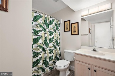 Discover waterfront living at its finest in this top floor, end on Bethany Bay Golf Club in Delaware - for sale on GolfHomes.com, golf home, golf lot