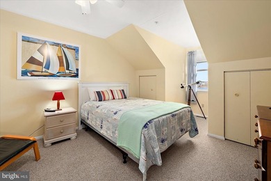 Discover waterfront living at its finest in this top floor, end on Bethany Bay Golf Club in Delaware - for sale on GolfHomes.com, golf home, golf lot