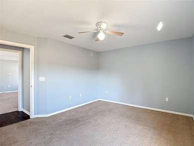 Great home with a gated entry, a well-maintained community, and on Meadow Oaks Golf and Country Club in Florida - for sale on GolfHomes.com, golf home, golf lot