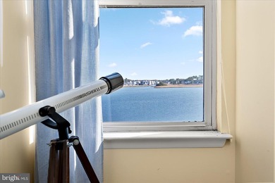 Discover waterfront living at its finest in this top floor, end on Bethany Bay Golf Club in Delaware - for sale on GolfHomes.com, golf home, golf lot