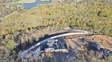 Brand new 50 year roof has been installed and the driveway has on The Orchard Golf and Country Club in Georgia - for sale on GolfHomes.com, golf home, golf lot