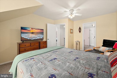 Discover waterfront living at its finest in this top floor, end on Bethany Bay Golf Club in Delaware - for sale on GolfHomes.com, golf home, golf lot