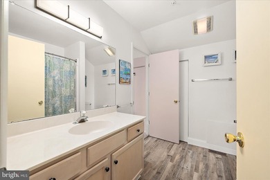 Discover waterfront living at its finest in this top floor, end on Bethany Bay Golf Club in Delaware - for sale on GolfHomes.com, golf home, golf lot