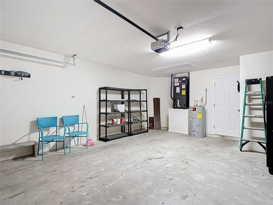 Great home with a gated entry, a well-maintained community, and on Meadow Oaks Golf and Country Club in Florida - for sale on GolfHomes.com, golf home, golf lot