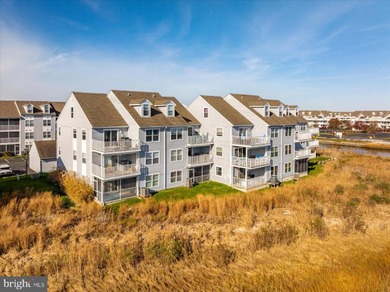 Discover waterfront living at its finest in this top floor, end on Bethany Bay Golf Club in Delaware - for sale on GolfHomes.com, golf home, golf lot