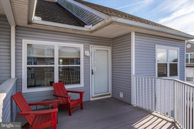 Discover waterfront living at its finest in this top floor, end on Bethany Bay Golf Club in Delaware - for sale on GolfHomes.com, golf home, golf lot