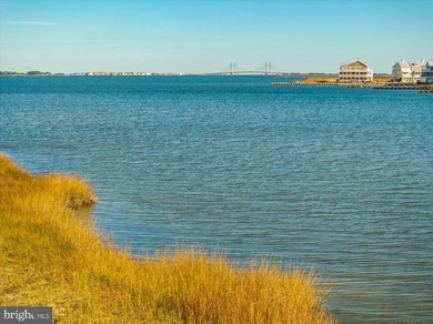 Discover waterfront living at its finest in this top floor, end on Bethany Bay Golf Club in Delaware - for sale on GolfHomes.com, golf home, golf lot
