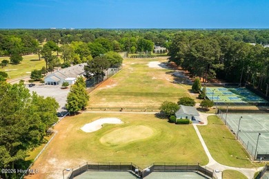 If you enjoy golf, tennis, pickle ball or hosting great parties on Greenville Country Club in North Carolina - for sale on GolfHomes.com, golf home, golf lot
