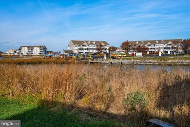 Discover waterfront living at its finest in this top floor, end on Bethany Bay Golf Club in Delaware - for sale on GolfHomes.com, golf home, golf lot