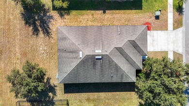 Great home with a gated entry, a well-maintained community, and on Meadow Oaks Golf and Country Club in Florida - for sale on GolfHomes.com, golf home, golf lot