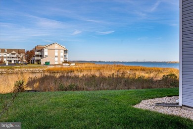 Discover waterfront living at its finest in this top floor, end on Bethany Bay Golf Club in Delaware - for sale on GolfHomes.com, golf home, golf lot