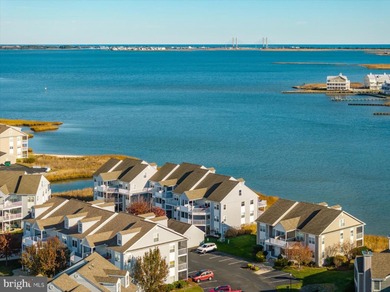 Discover waterfront living at its finest in this top floor, end on Bethany Bay Golf Club in Delaware - for sale on GolfHomes.com, golf home, golf lot