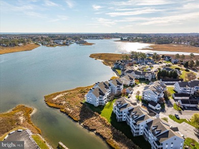 Discover waterfront living at its finest in this top floor, end on Bethany Bay Golf Club in Delaware - for sale on GolfHomes.com, golf home, golf lot