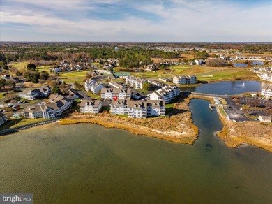 Discover waterfront living at its finest in this top floor, end on Bethany Bay Golf Club in Delaware - for sale on GolfHomes.com, golf home, golf lot