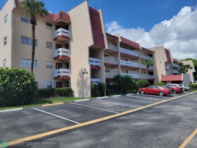 Experience Florida living in this spacious, bright unit located on Oriole Golf and Tennis Club in Florida - for sale on GolfHomes.com, golf home, golf lot