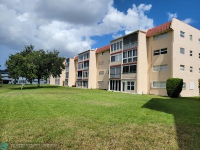 Experience Florida living in this spacious, bright unit located on Oriole Golf and Tennis Club in Florida - for sale on GolfHomes.com, golf home, golf lot