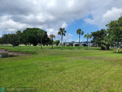 Experience Florida living in this spacious, bright unit located on Oriole Golf and Tennis Club in Florida - for sale on GolfHomes.com, golf home, golf lot