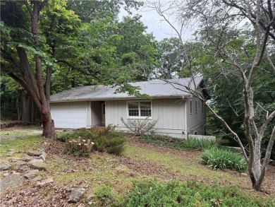 Lake View Home with Workshop  Great Potential!

This 3-bedroom on Holiday Island Executive Golf Course in Arkansas - for sale on GolfHomes.com, golf home, golf lot