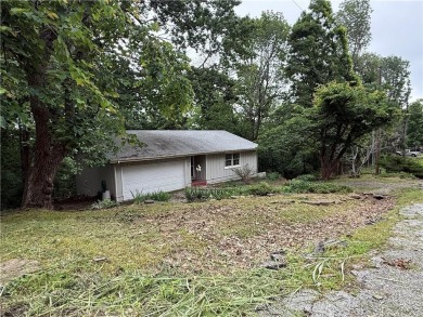 Lake View Home with Workshop  Great Potential!

This 3-bedroom on Holiday Island Executive Golf Course in Arkansas - for sale on GolfHomes.com, golf home, golf lot