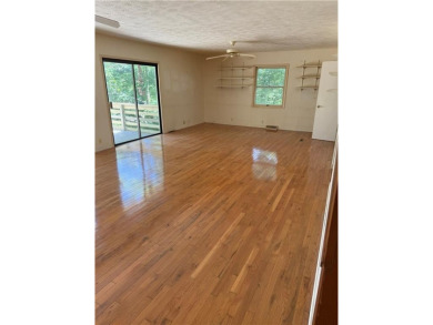 Lake View Home with Workshop  Great Potential!

This 3-bedroom on Holiday Island Executive Golf Course in Arkansas - for sale on GolfHomes.com, golf home, golf lot
