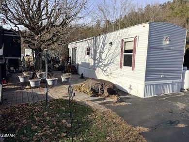 AMAZINGLY beautiful CREEK lot with a 2010 Heritage Park Model! on Bent Creek Golf Course in Tennessee - for sale on GolfHomes.com, golf home, golf lot