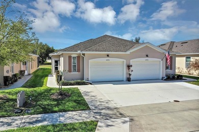 ENJOY THE MAINTENANCE-FREE LIFESTYLE, CONVENIENT GOLF-FRONT LOT on Arlington Ridge Golf Club in Florida - for sale on GolfHomes.com, golf home, golf lot