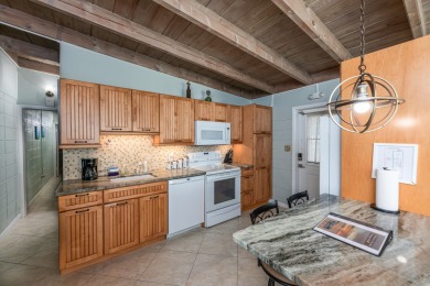 Beautiful 2 bedroom, 2 bath canal front half duplex in the on Key Colony Beach Golf Course in Florida - for sale on GolfHomes.com, golf home, golf lot