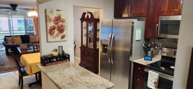 Updated 2 bed 2 bath in Sunrise Lakes Solid Wood Cherry Shaker on Sunrise Lakes Phase III in Florida - for sale on GolfHomes.com, golf home, golf lot