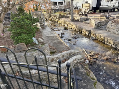 AMAZINGLY beautiful CREEK lot with a 2010 Heritage Park Model! on Bent Creek Golf Course in Tennessee - for sale on GolfHomes.com, golf home, golf lot