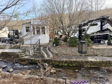 AMAZINGLY beautiful CREEK lot with a 2010 Heritage Park Model! on Bent Creek Golf Course in Tennessee - for sale on GolfHomes.com, golf home, golf lot