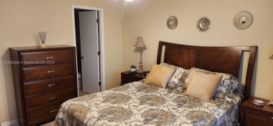 Updated 2 bed 2 bath in Sunrise Lakes Solid Wood Cherry Shaker on Sunrise Lakes Phase III in Florida - for sale on GolfHomes.com, golf home, golf lot