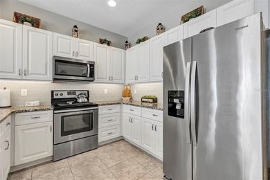 ENJOY THE MAINTENANCE-FREE LIFESTYLE, CONVENIENT GOLF-FRONT LOT on Arlington Ridge Golf Club in Florida - for sale on GolfHomes.com, golf home, golf lot