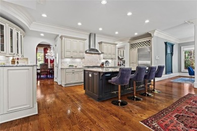 Welcome to an extraordinary six-bedroom, seven full and two on The Golf Club of Georgia in Georgia - for sale on GolfHomes.com, golf home, golf lot