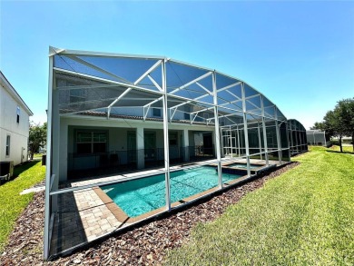 This spacious 8-bedroom, 5-bathroom home in a gated community on The Oasis Club at Champions Gate in Florida - for sale on GolfHomes.com, golf home, golf lot