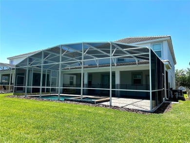 This spacious 8-bedroom, 5-bathroom home in a gated community on The Oasis Club at Champions Gate in Florida - for sale on GolfHomes.com, golf home, golf lot